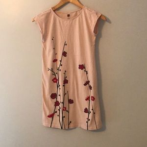 I am selling a tea dress - girls. It has 2 dresses